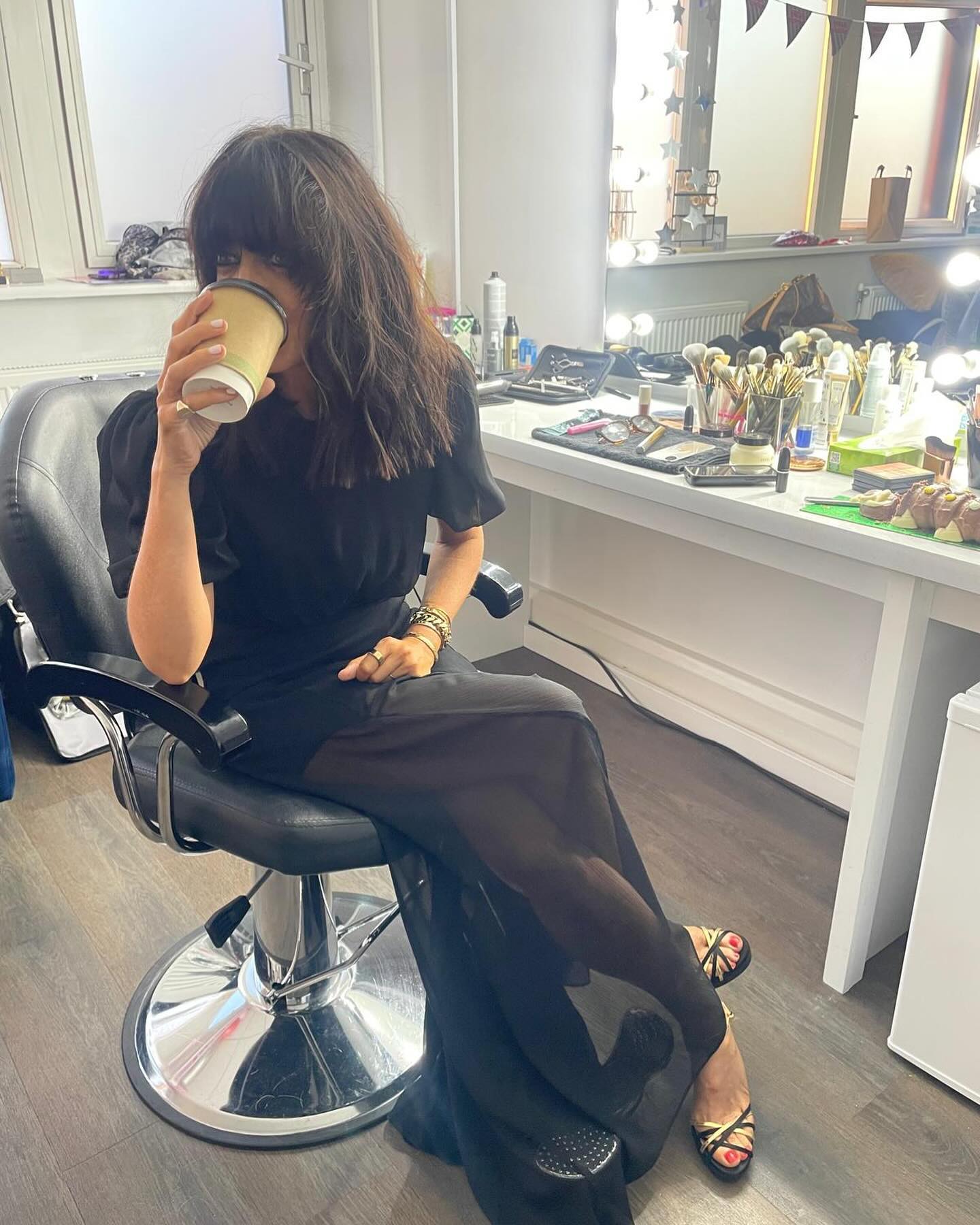 where to get all claudia Winkleman Strictly Come Dancing outfits black short sleeve dress sheer skirt yellow and black sandals what is Claudia wearing 12 October 2024 Photo Claudia Winkleman