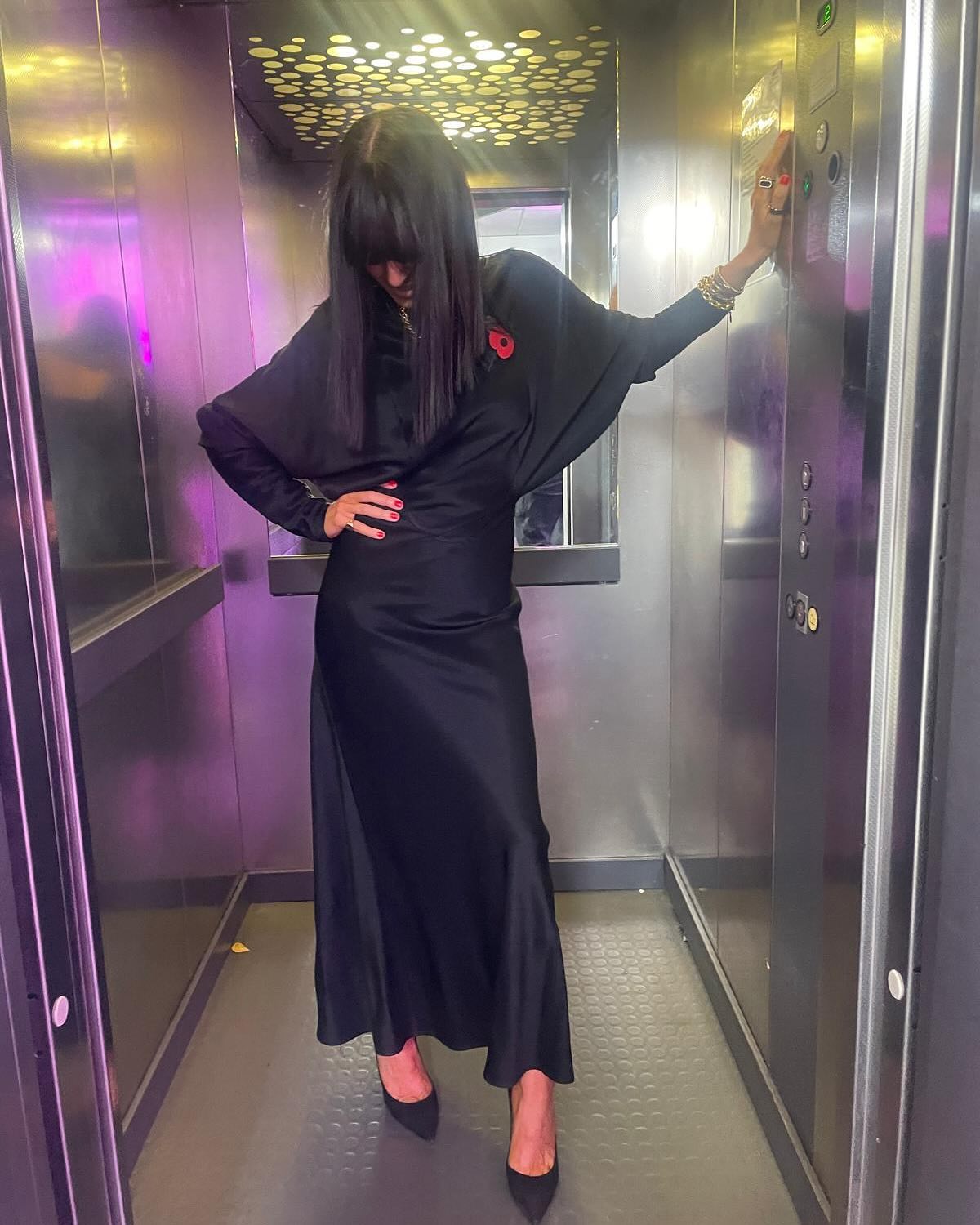 where to get all claudia Winkleman Strictly Come Dancing outfits black satin batwing midaxi dress black suede court shoes what is Claudia wearing 9 November 2024 Photo Claudia Winkleman
