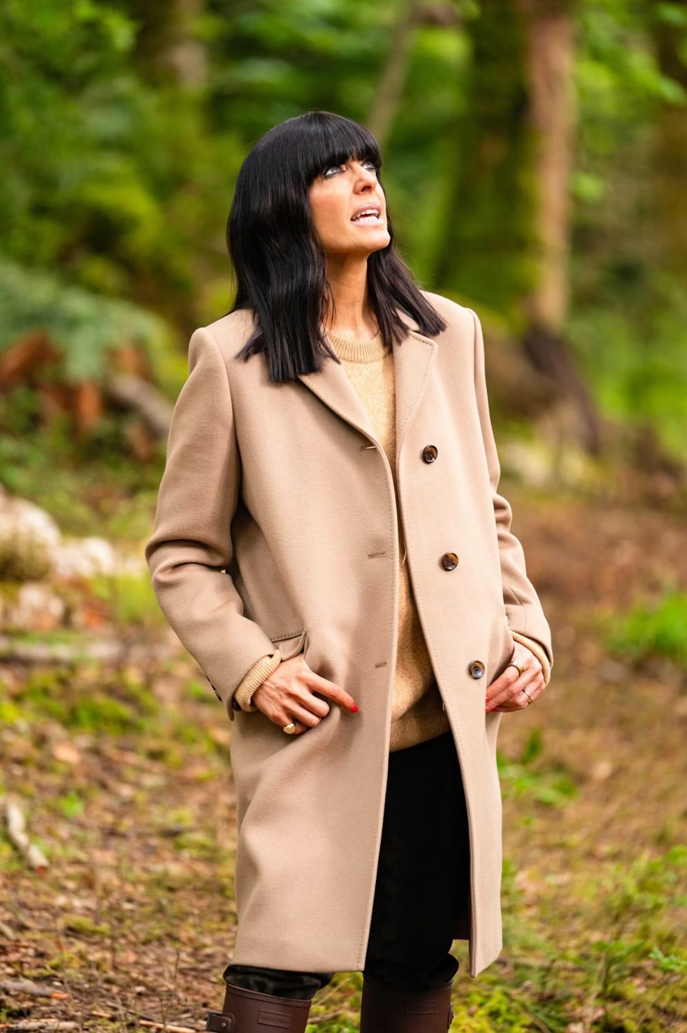 where to get all Claudia Winkleman The Traitors outfits beige coat beige jumper black velvet trousers 8 January 2025 Photo Claudia winkleman Lambert Studios Euan Cherry