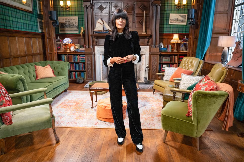 where to get all Claudia Winkleman The Traitors outfits black velvet jumpsuit 2 January 2025 Photo BBC