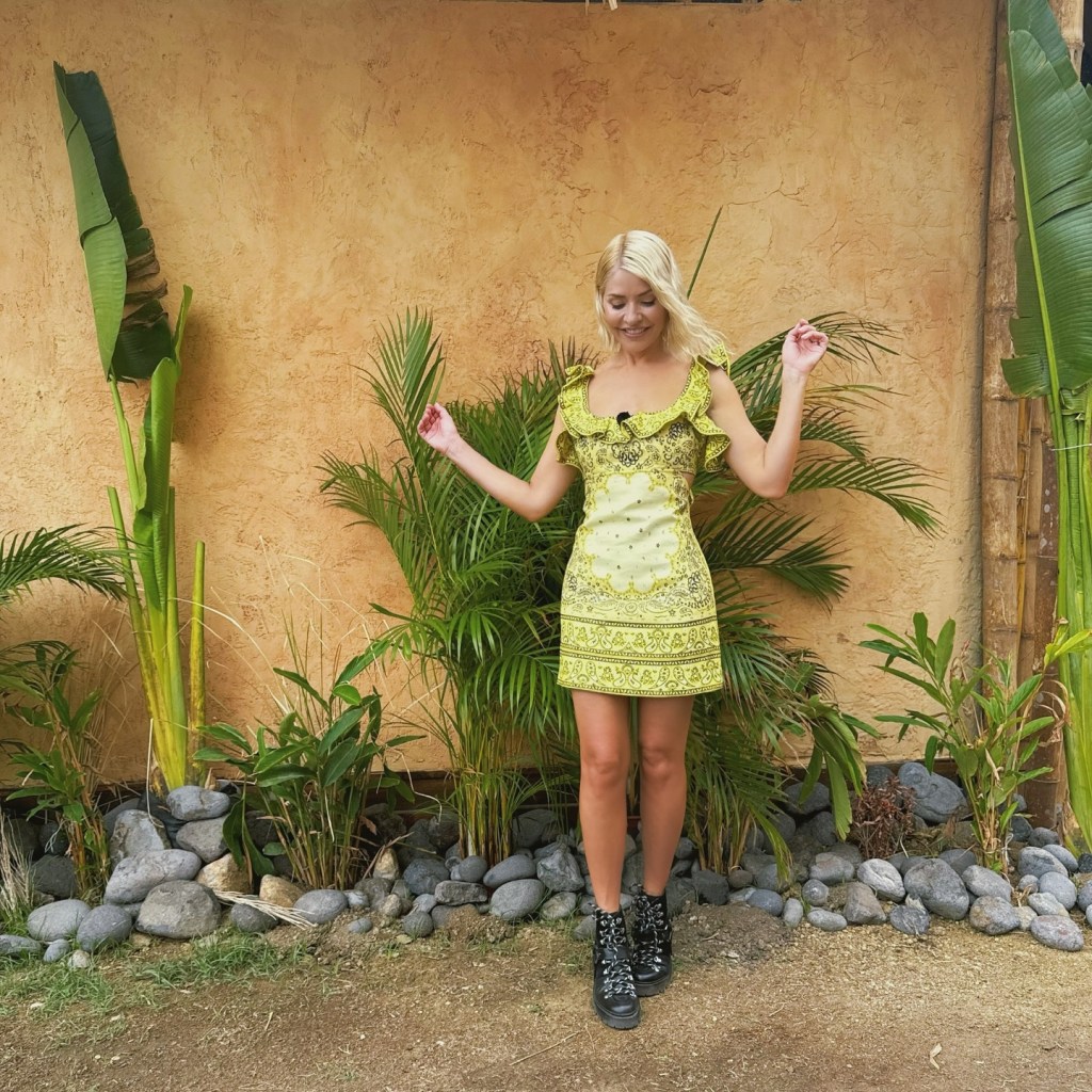 where to get all holly Willoughby Celebrity Bear Hunt outfits yellow ruffled paisley mini dress black hiking boots what is Holly wearing  19 February 2025 Photo Holly Willoughby