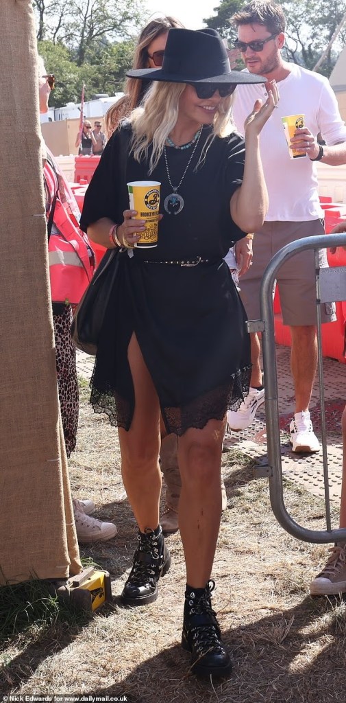 where to get all Holly Willoughby outfits black lace trim mini dress black hiking boots Glastonbury what is holly willoughby wering 28 June 2025 photo Nick Edwards Daily Mail