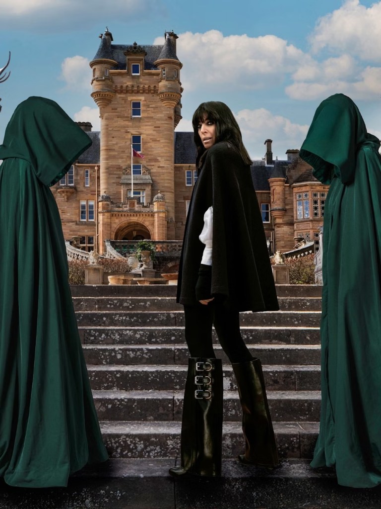 where to get all Claudia Winkleman Celebrity Traitors outfits black cape black buckle patent boots black leggings 8 October 2025 Photo BBC Studio Lambert Studios Cody Burridge