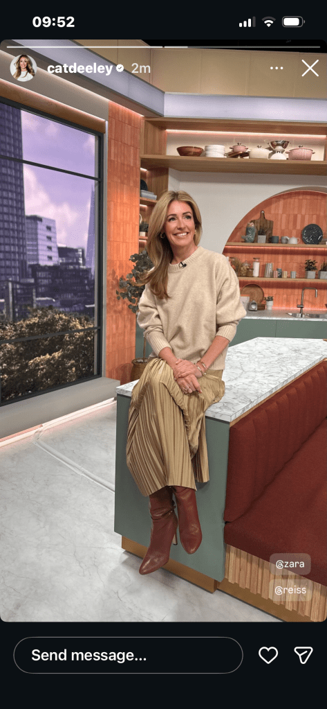 where to get all Cat Deeley this Morning outfits beige jumper gold pleated midi skirt brown boots what is Cat wearing 29 jANUARY 2026 Photo Cat Deeley