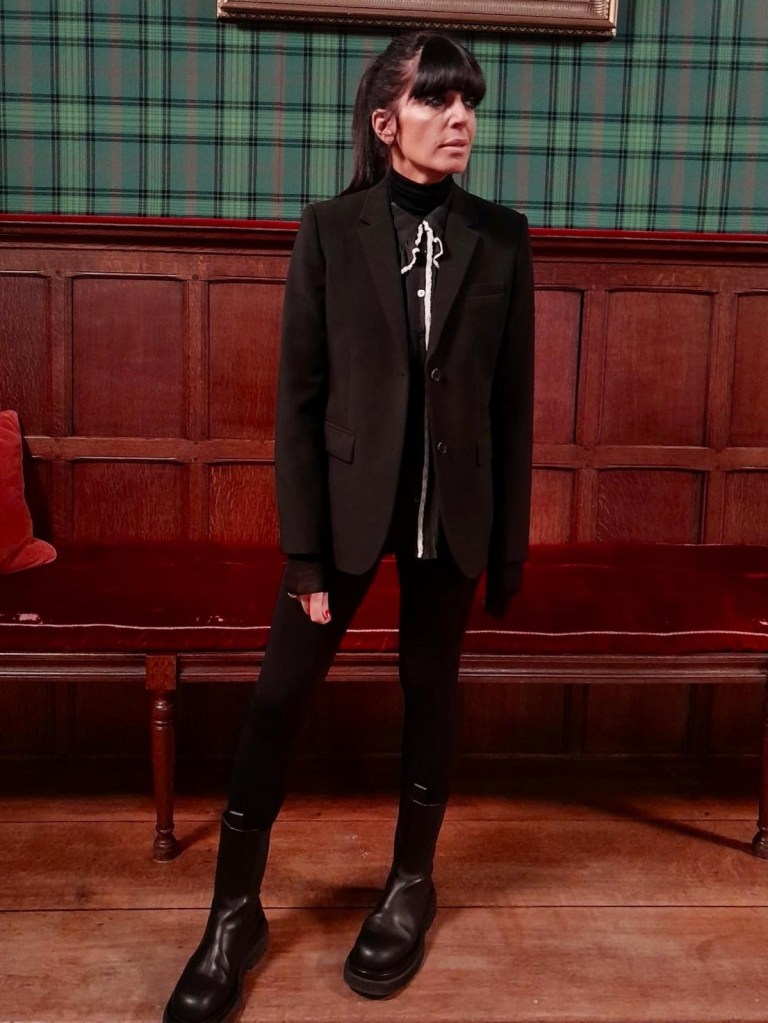 where to get all Claudia Winkleman The Traitors outfits black and white blouse black blazer black Chelsea boots what is Claudia wearing 22 January 2026 Photo Sinead McKeefry