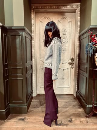 where to get all Claudia Winkleman The Traitors outfits grey fair isle jumper burgundey trousers camel cropped coat what is Claudia wearing 21 January 2026 Photo Sinead McKeefry v3