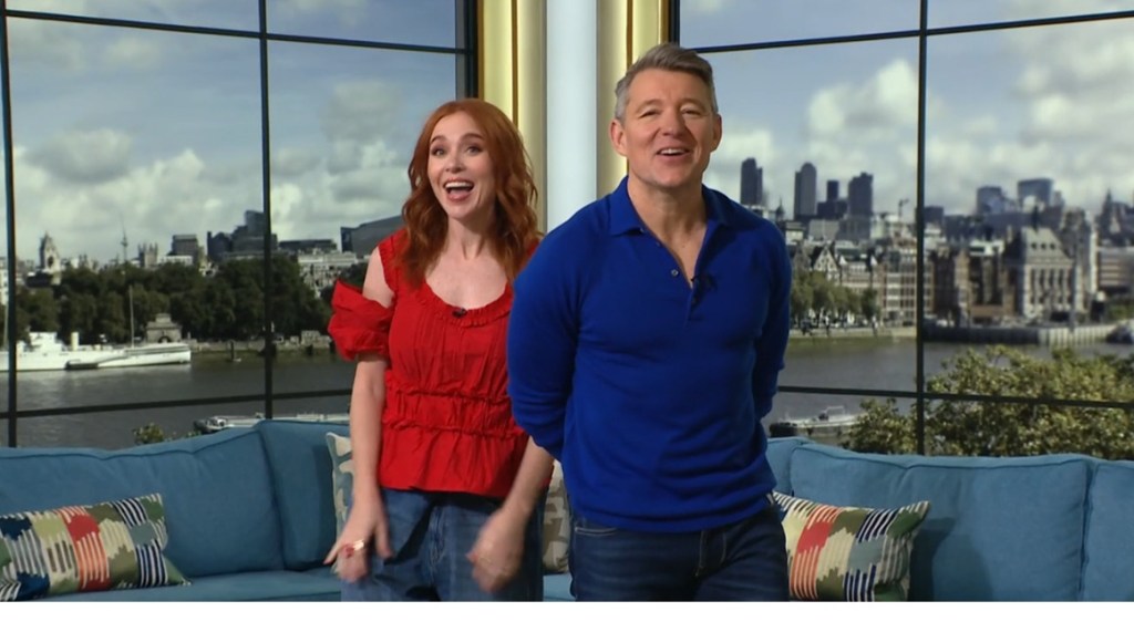 where to get all Angela Scanlon This morning outfits red ruched cold shoulder top what is Angela wearing 25 February 2026 Photo ITV v2