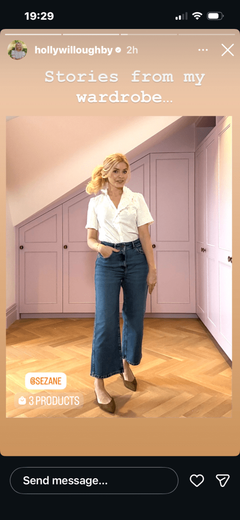 where to get all Holly Willoughby outfits white daisy embroidered blouse blue denim flare jeans green suede shoes what is Holly wearing 9 March 2026 Photo Holly Willoughby