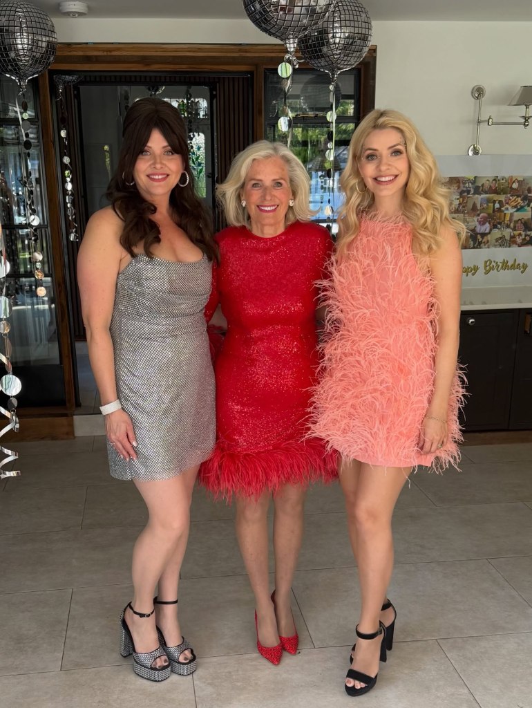 where to get all Holly Willlighby outfits pink feather mini dress black suede sandals what is Holly wearing 26 April 2026 Photo Holly Willoughby